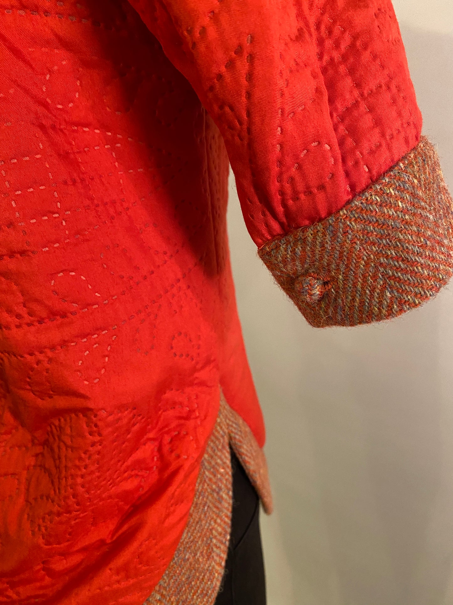 Rudraksha Jacket. Quilted front with Orange Harris Tweed