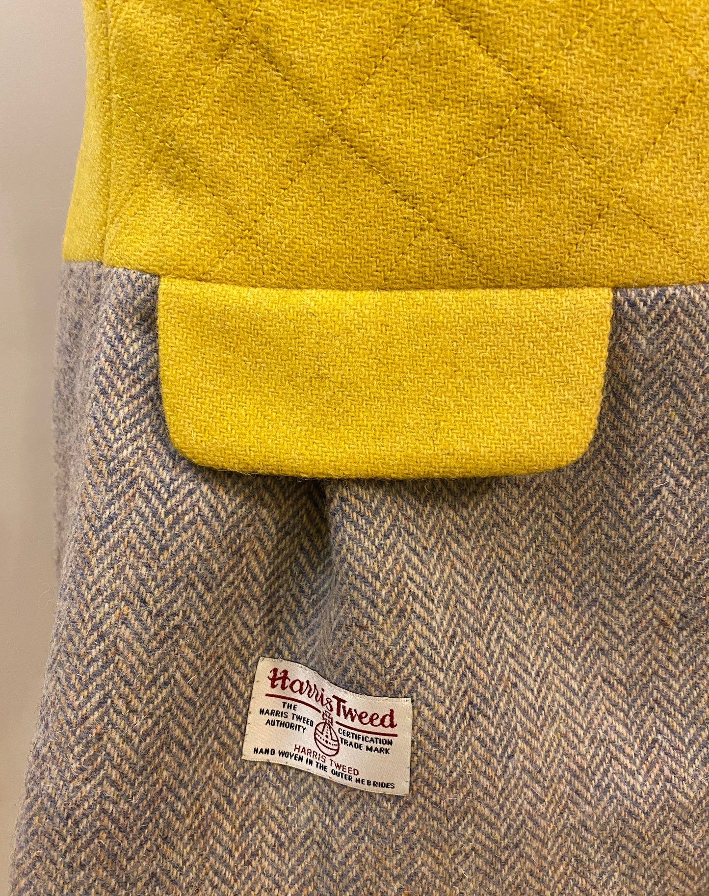 Shasta Vest. Yellow and grey herringbone Harris Tweed