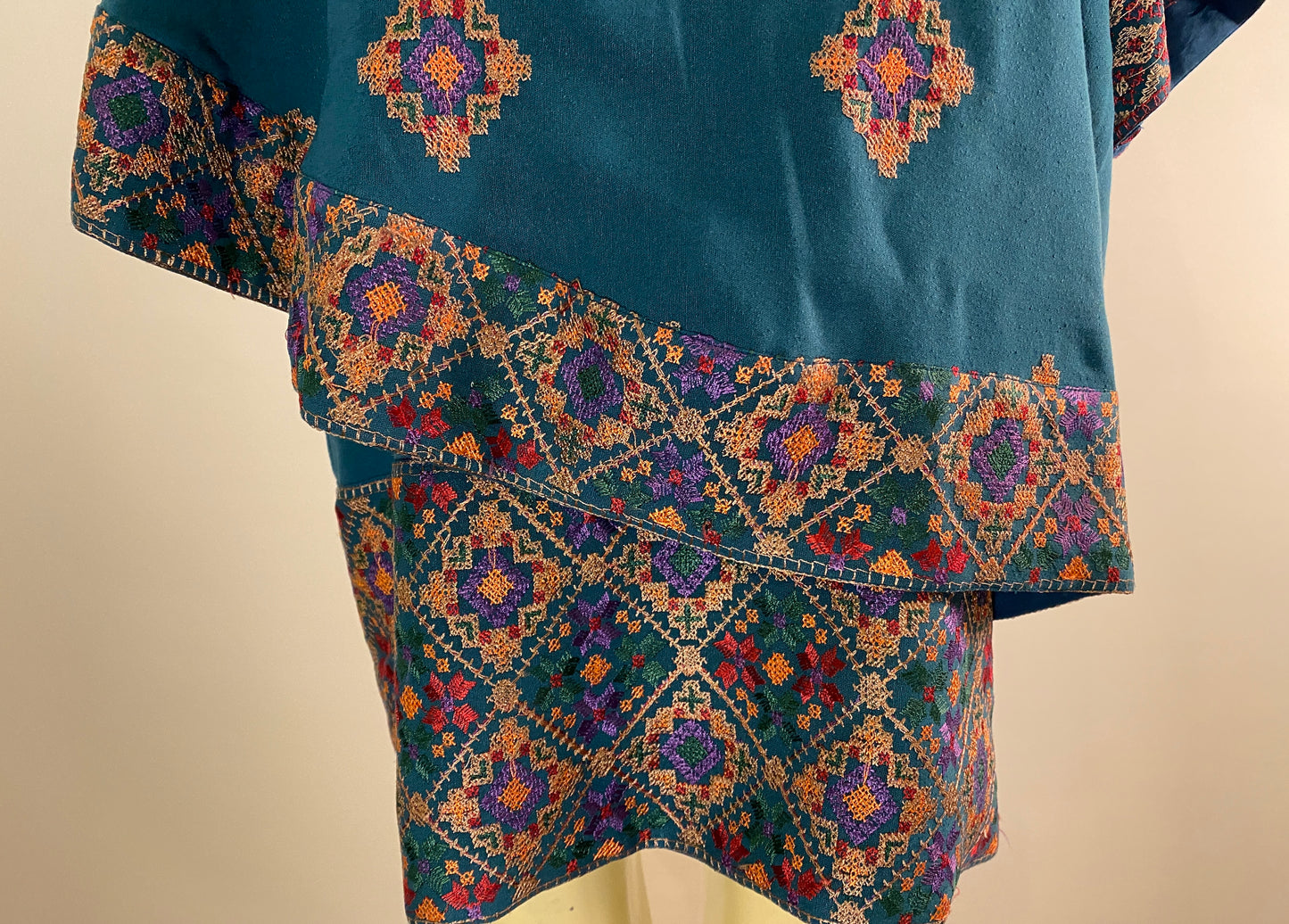 Petal Shawl Shirt in Turquoise Cross Stitch