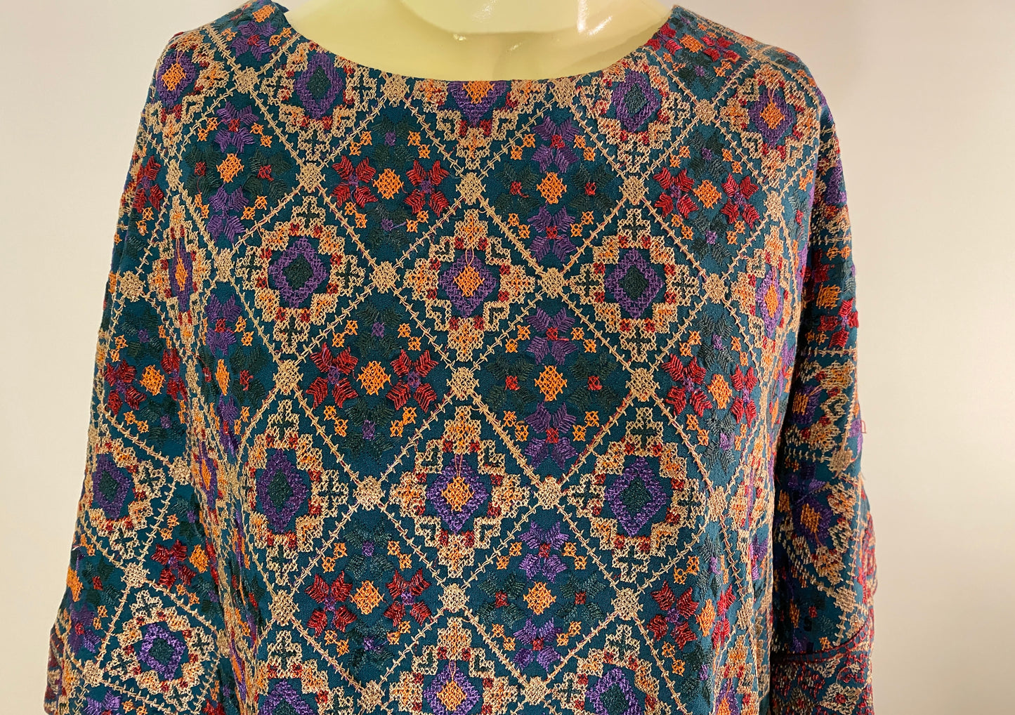 Petal Shawl Shirt in Turquoise Dense Cross Stitch