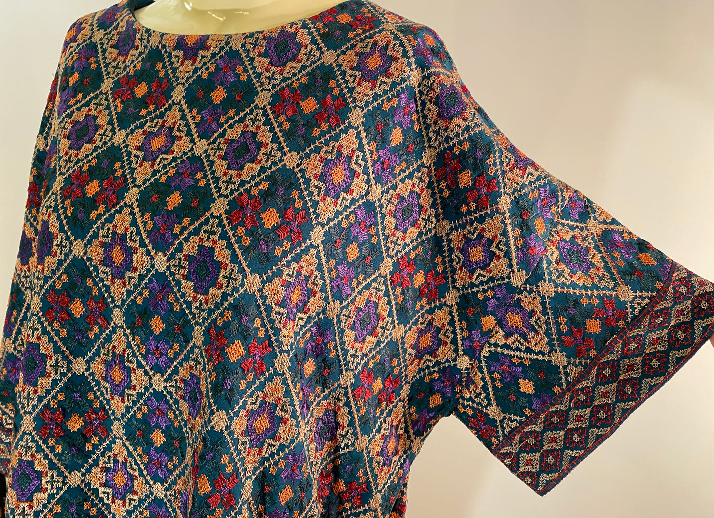 Petal Shawl Shirt in Turquoise Dense Cross Stitch